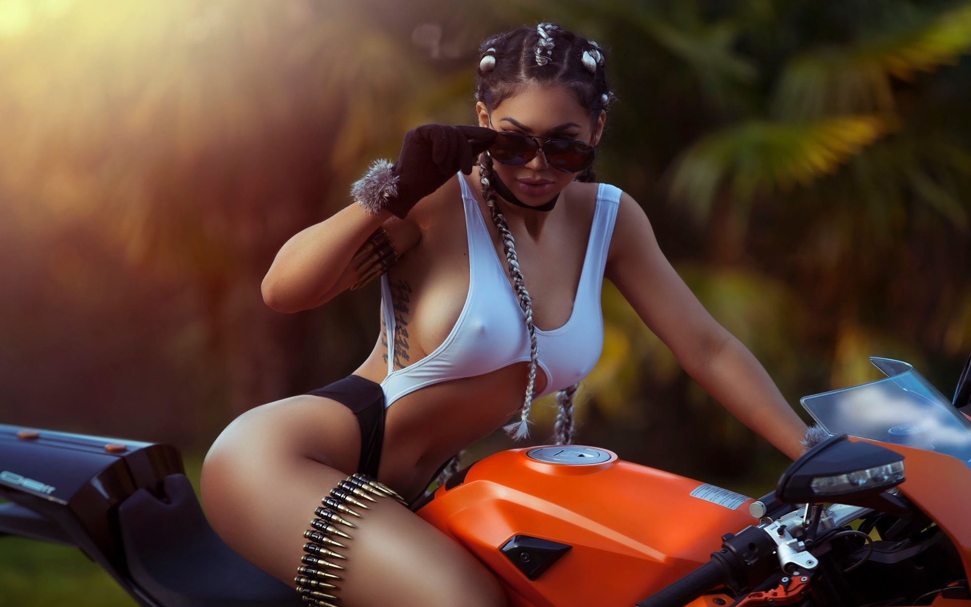 Take a pause and enjoy Girls with tattoos and motorcycles — streaming from Khartoum